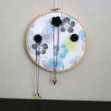 Poppies Wall Hanger With Example Necklaces