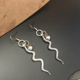Snake And Apple Long Statement Earrings, Silver Tone