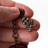 Black And Red Rose With Copper Tone Skull Charm
