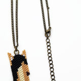 Tan And Black Beaded Horse Head Necklace On Adjustable Chain