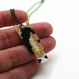 Tan And Black Beaded Horse Head Necklace On Adjustable Chain