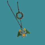 Beaded Dragon In Green And Gray With Celtic Infinity Charm