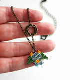Beaded Dragon In Green And Gray With Celtic Infinity Charm