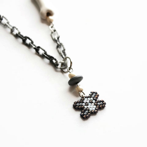 Mini Skull And Cross Bones Statement Necklace With Ceramic Bone Accent