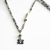 Mini Skull And Cross Bones Statement Necklace With Ceramic Bone Accent