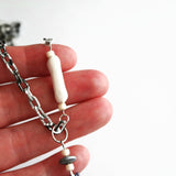 Mini Skull And Cross Bones Statement Necklace With Ceramic Bone Accent