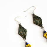 Long Summer Flower Statement Earrings In Patina Green, Yellow, And Blue