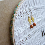 Decorative White Fabric Earring Hanger In Use 2
